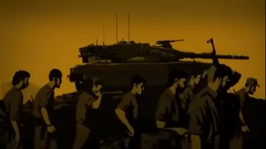 חיילים הולכים ליד טנק